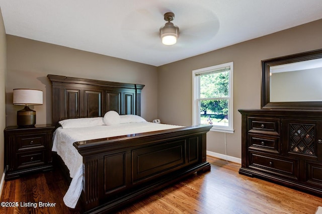 bedroom featuring ceiling fan and light wood-type flooring