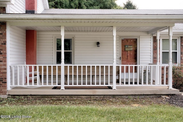 property entrance with covered porch