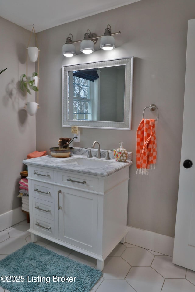 bathroom with vanity and tile patterned floors