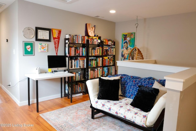 living area featuring hardwood / wood-style flooring