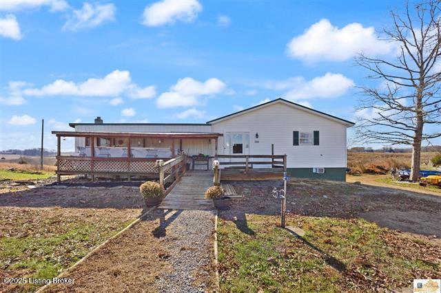 rear view of house with a deck