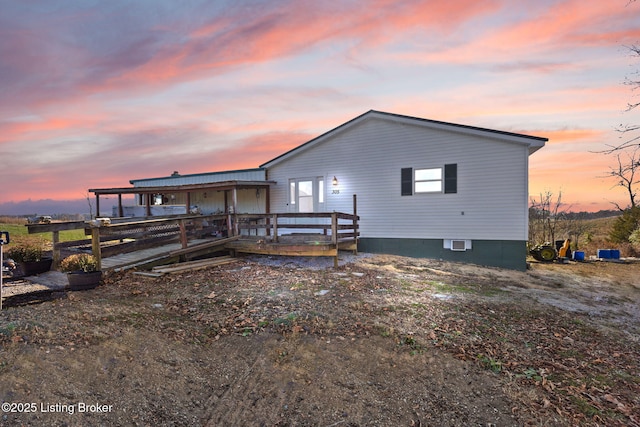 view of front of house with a deck