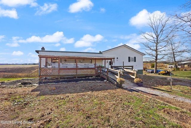 view of front of house featuring a deck