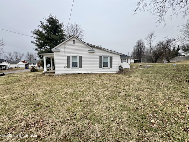 view of home's exterior featuring a lawn