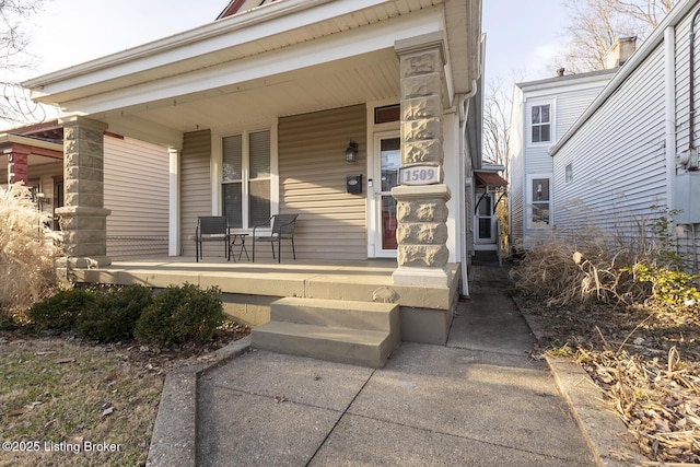 entrance to property with covered porch