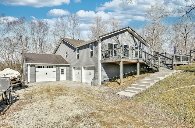 view of home's exterior with a wooden deck