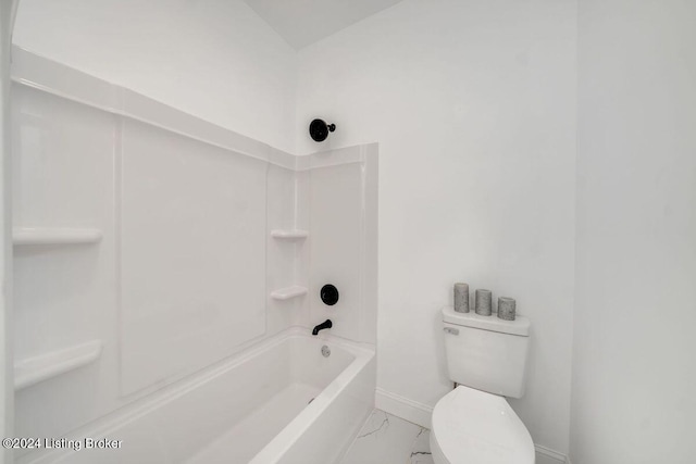 bathroom with shower / bathtub combination and toilet