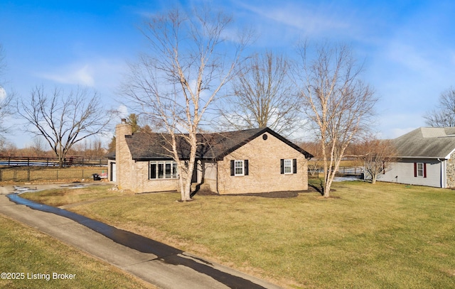 view of property exterior with a lawn