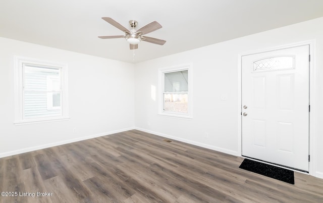 entrance foyer featuring dark hardwood / wood-style floors and ceiling fan