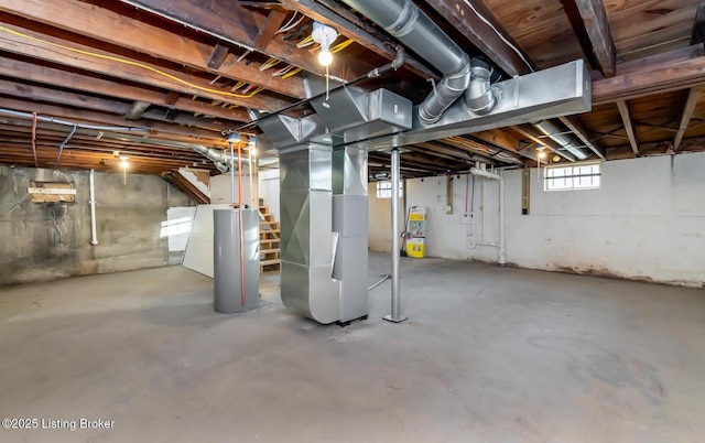 basement with heating unit and water heater