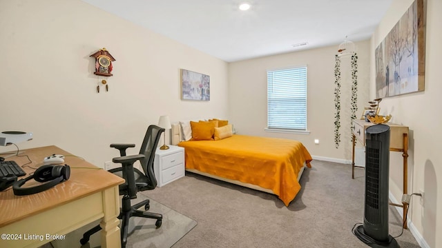 bedroom with light carpet