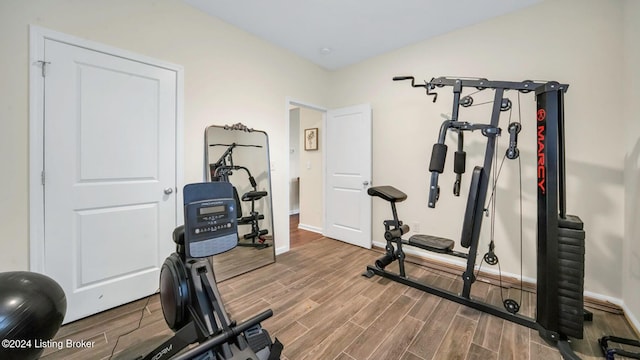 workout room featuring vaulted ceiling