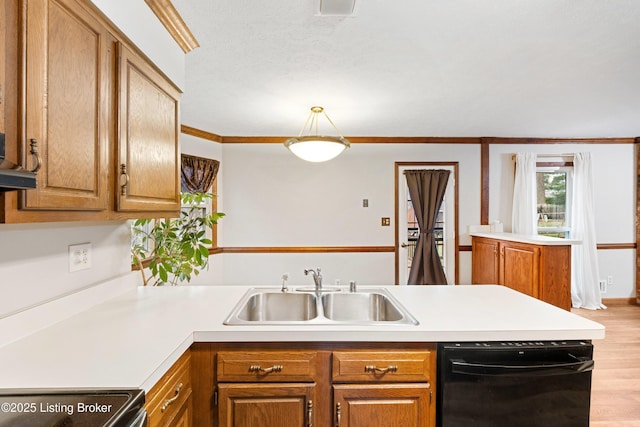 kitchen featuring dishwasher, sink, ornamental molding, light hardwood / wood-style floors, and kitchen peninsula