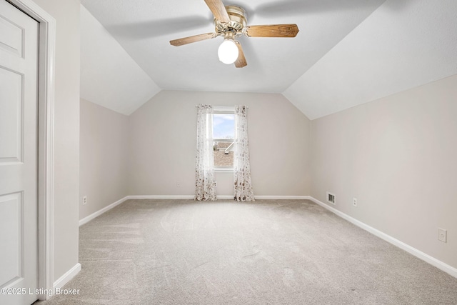 bonus room with carpet, lofted ceiling, and ceiling fan