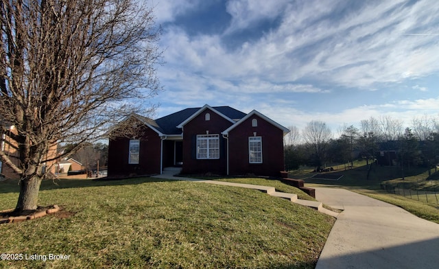 single story home with a front yard