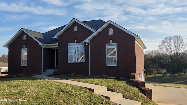 view of property featuring a front yard