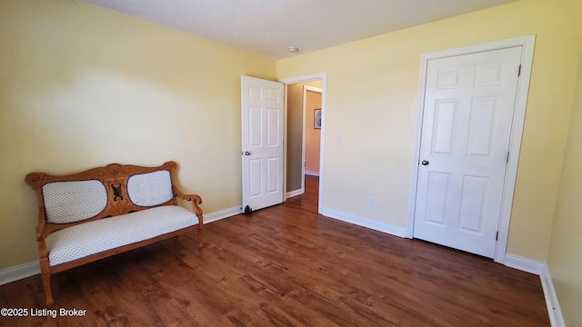 unfurnished room featuring dark hardwood / wood-style flooring