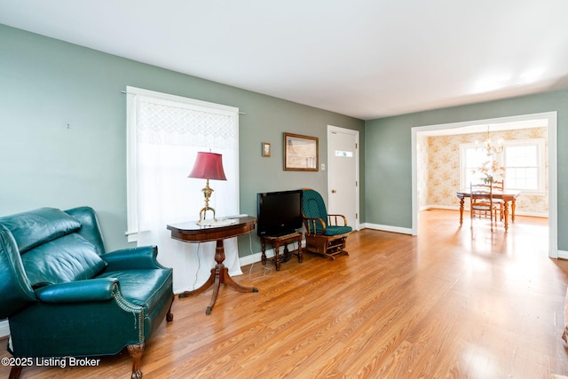 sitting room featuring light hardwood / wood-style floors