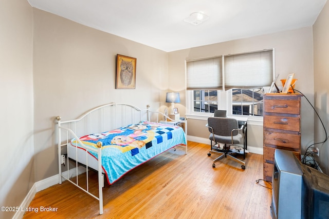 bedroom featuring hardwood / wood-style flooring