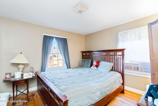 bedroom featuring light wood-type flooring