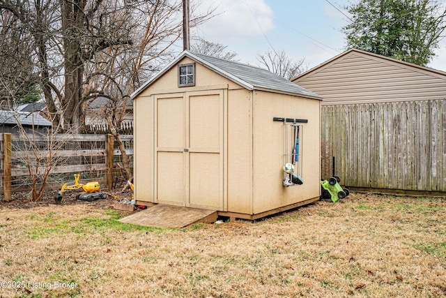 view of outdoor structure featuring a yard