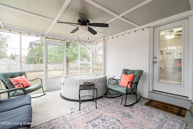 sunroom / solarium with ceiling fan