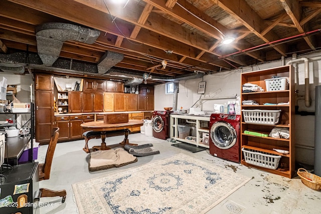 basement featuring washer and dryer and a workshop area