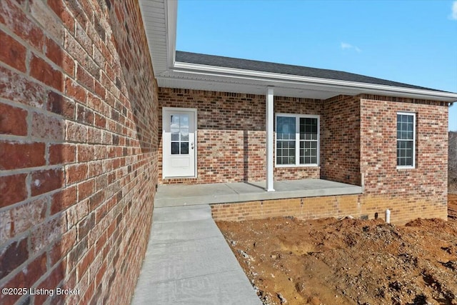 doorway to property featuring a patio area