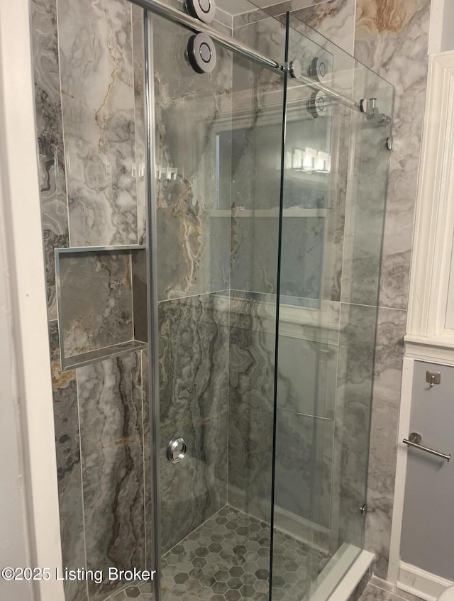 bathroom with a stall shower