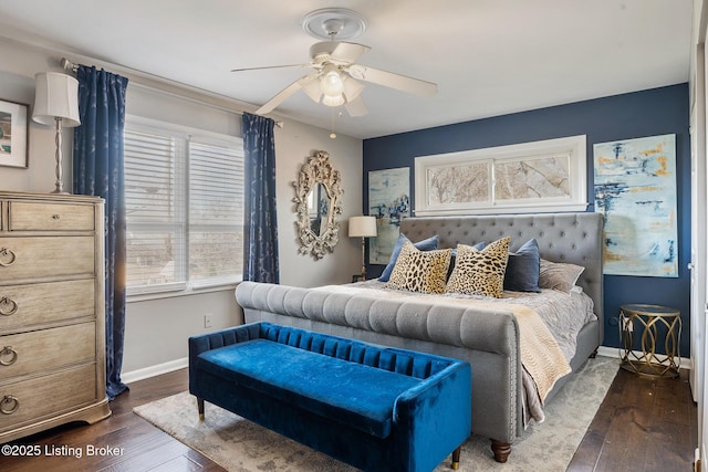 bedroom featuring ceiling fan and dark hardwood / wood-style floors