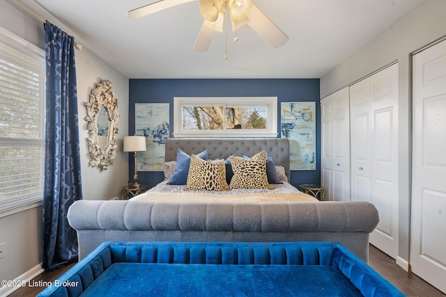 bedroom with wood-type flooring and ceiling fan