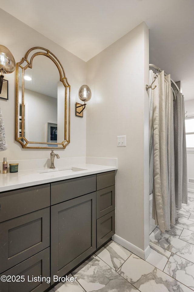 bathroom with vanity and a shower with shower curtain