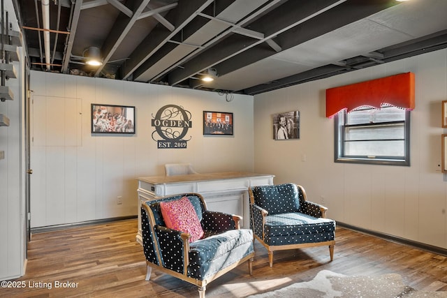 sitting room featuring hardwood / wood-style floors