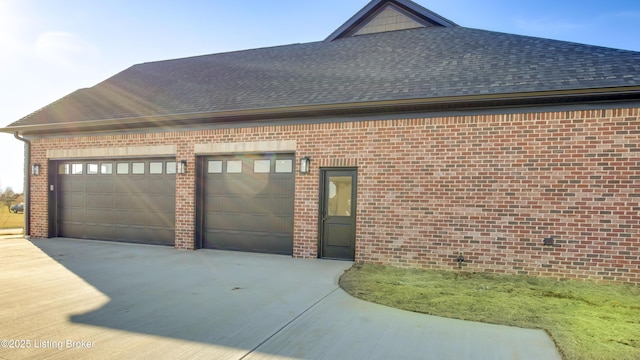 view of property exterior with a garage