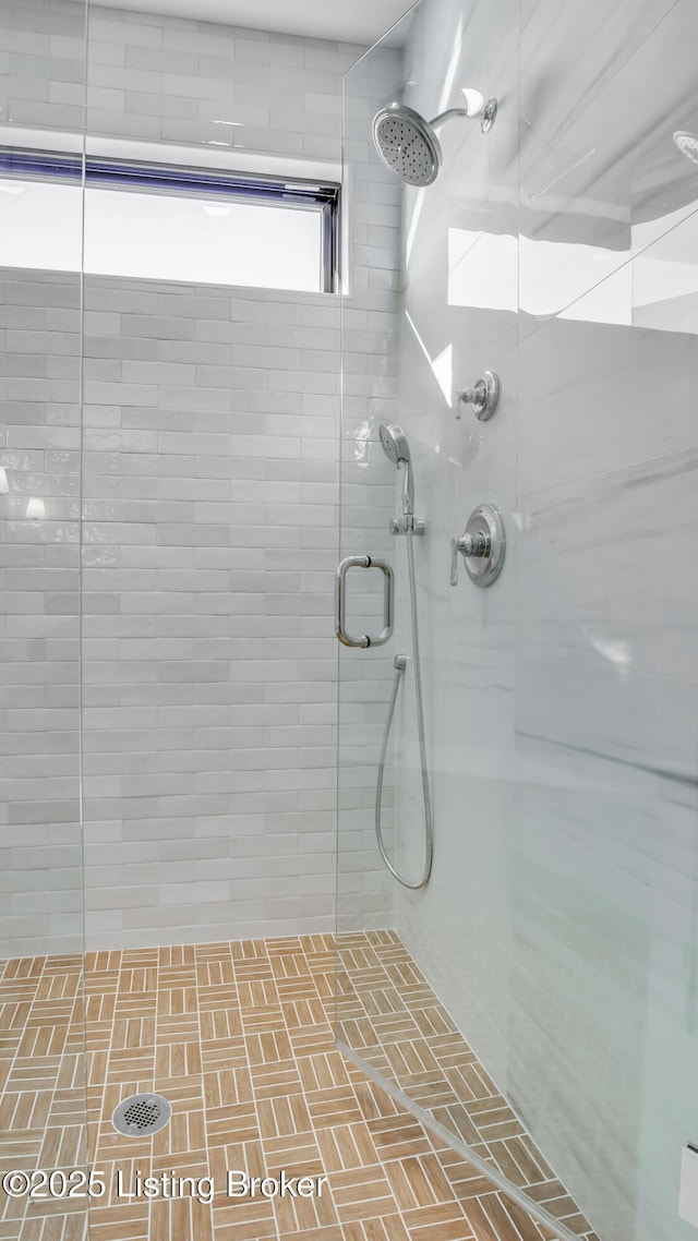 bathroom featuring walk in shower