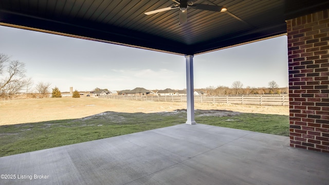 view of patio featuring ceiling fan