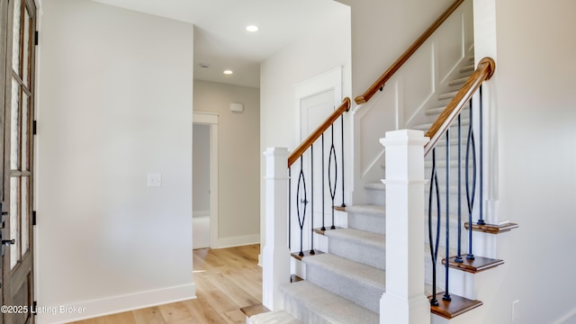 entryway with light hardwood / wood-style floors