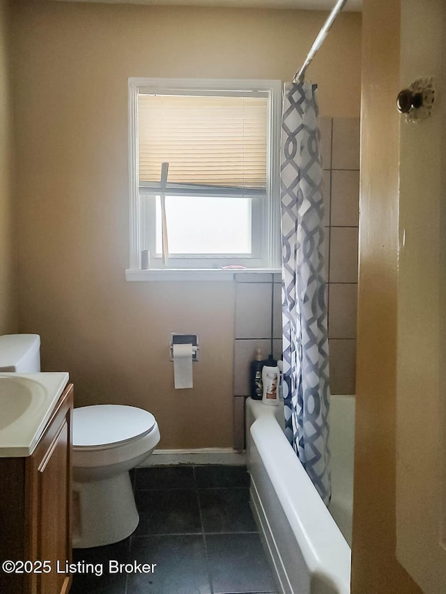 full bathroom featuring vanity, tile patterned floors, toilet, and shower / bathtub combination with curtain