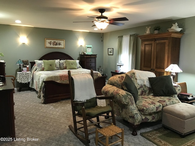 carpeted bedroom featuring ceiling fan