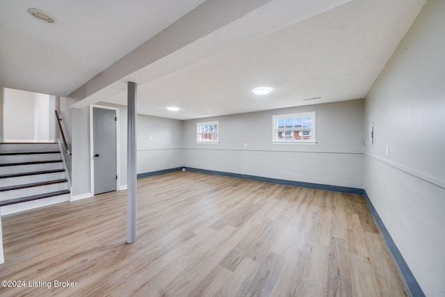 basement featuring light hardwood / wood-style flooring