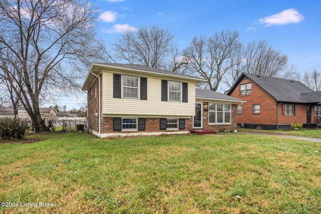 view of front of home with a front yard