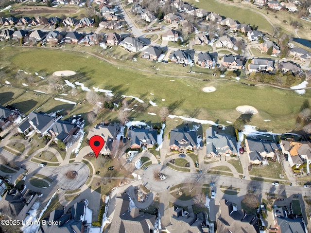 bird's eye view featuring view of golf course and a residential view