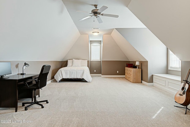 bedroom featuring light colored carpet, visible vents, vaulted ceiling, and baseboards