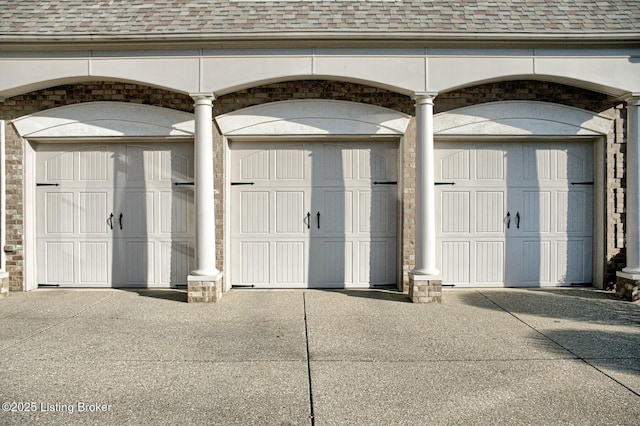 garage with driveway