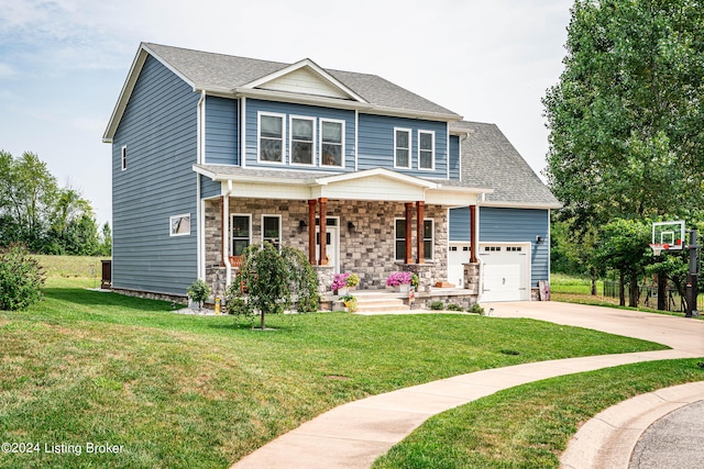 craftsman-style home featuring a garage, covered porch, and a front lawn