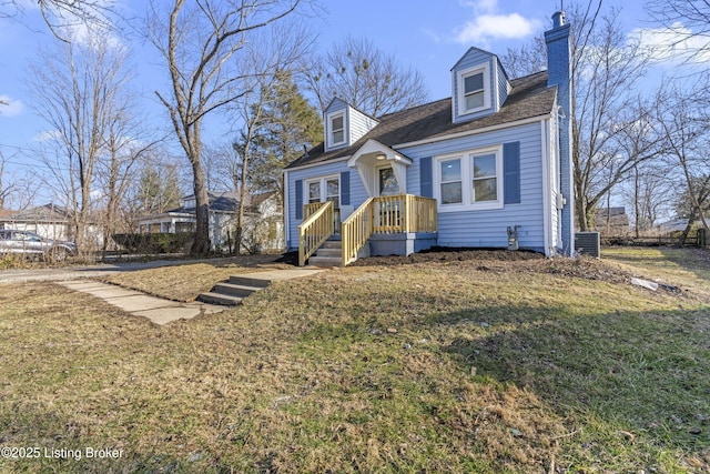 cape cod home with central air condition unit and a front lawn