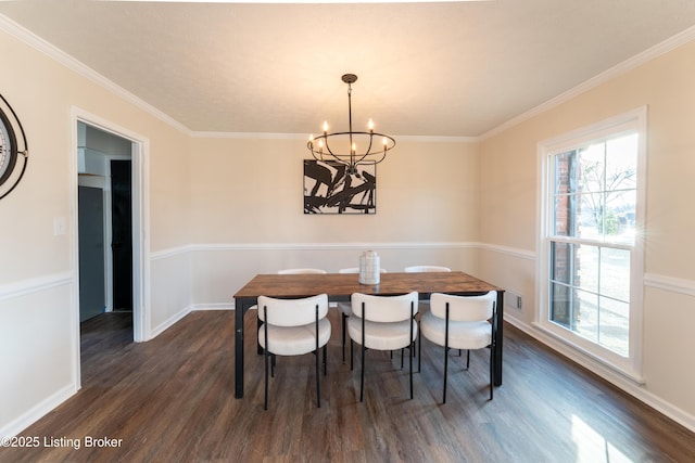 dining area with plenty of natural light, a chandelier, and dark hardwood / wood-style flooring