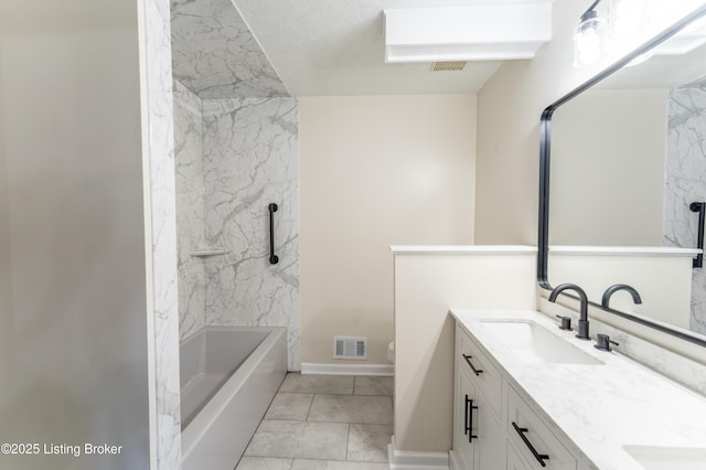 full bathroom featuring vanity, toilet, and tiled shower / bath combo