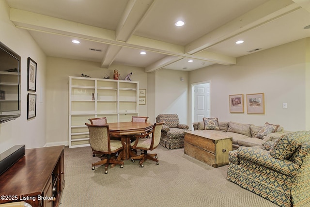 living area featuring recessed lighting, visible vents, beamed ceiling, and carpet