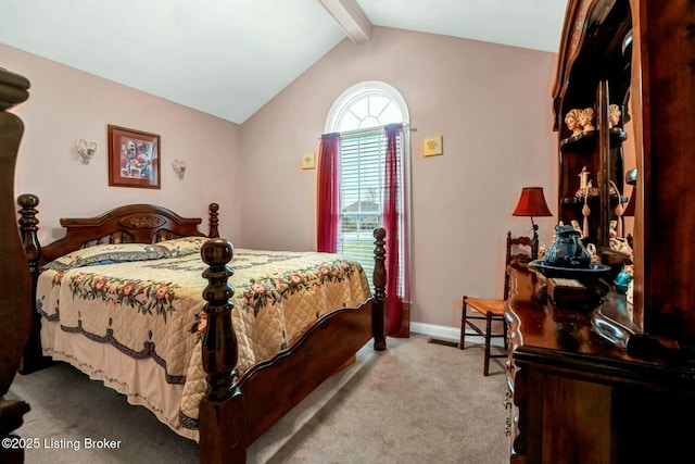 carpeted bedroom with vaulted ceiling with beams